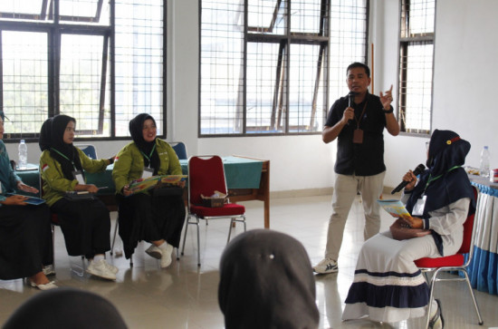 Dispersip Kampar Menjadi Narasumber Membaca nyaring di Tambang